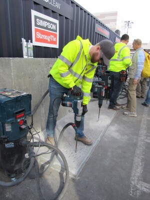 A combihammer combined with a dust-extraction bit drills holes cleanly.